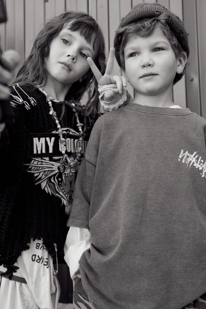 Black and white portrait of two kids